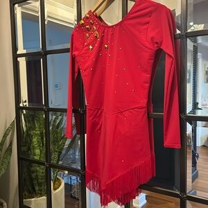 Red Figure Skating Dresses with Gold Embellishments. With an angel tassel bottom